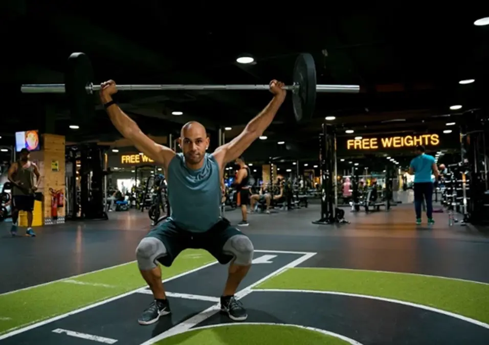 Man Lifting Barbell